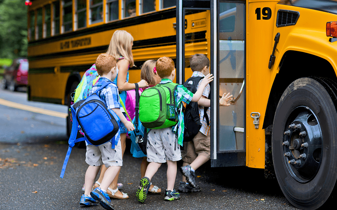 Children getting onto a bus | Wiers Fleet Parnters